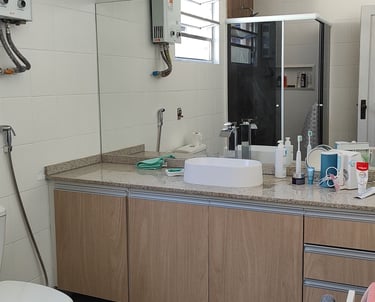 a bathroom with a toilet and a sink