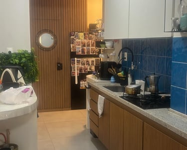 a kitchen with a sink and a stove