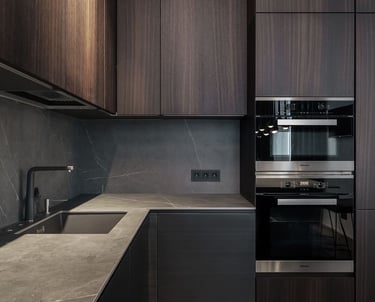 a kitchen with a wooden floor and a sink