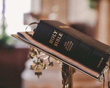Holy Bible on pulpit in church—Christian faith, Scripture, worship service