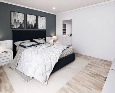 Modern bedroom with a teal accent wall, tan tufted headboard, white dressers, and light wood flooring.