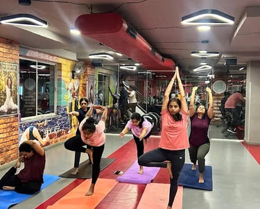 Spacious and modern group exercise studio at FitX1 Bangalore featuring high-energy Zumba and calming