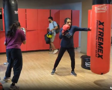 Professional Muay Thai and boxing training zone at FitX1 Bangalore for kids and adults.
