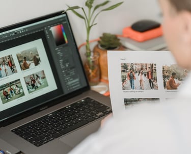 a man is holding a photo of a photo of a family photo