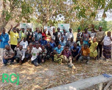 a group of people standing around a tree