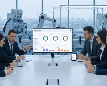 Business team in a boardroom viewing data analytics on a monitor in a high-tech robotic factory.