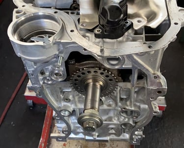 a car engine with a small engine in a garage