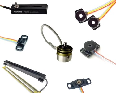 a collection of electronic components including a speaker and wires