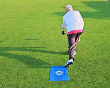 Porthcawl Bowls Club player playing bowls
