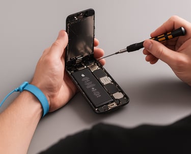 Technician replacing an iPhone battery