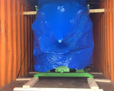 a large container with a blue covered product