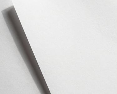 Abstract study of shadows on a textured paper white wall. Clean and minimalist. South Asian / Global Professional aesthetic.