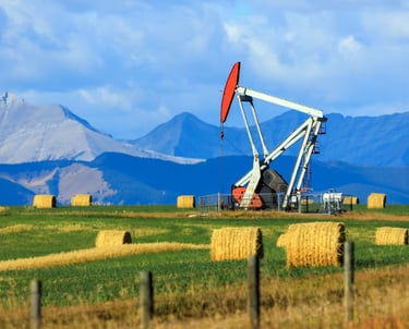 An oil pumpjack in Alberta, Canada, operating a reciprocating piston.