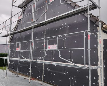 a house with scaffiered scaffolding on a scaffold