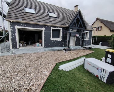 a house with a garage door and a garage door