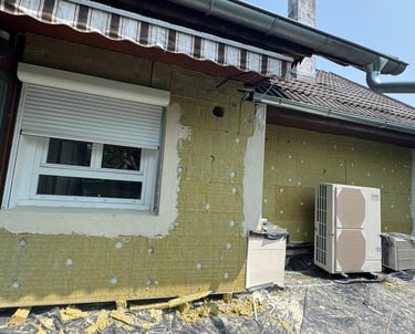 a refrigerator freezer sitting on top of a roof