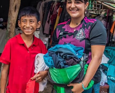 a woman and a boy are standing in front of a store