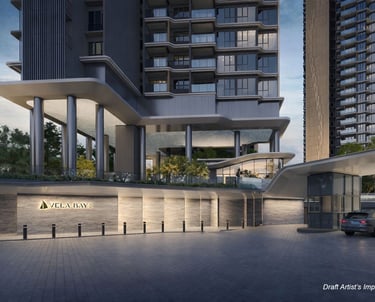 Modern luxury condominium entrance at Vela Bay with sleek architectural design and evening lighting.