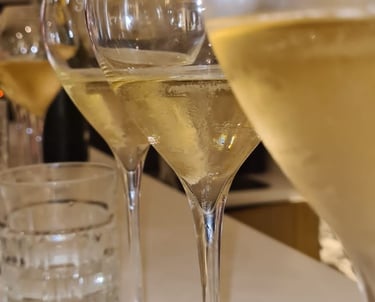 Champagne glass on a table in a wine cellar