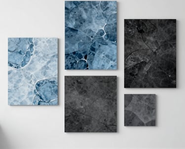 A clean, bright studio space with mood boards featuring ice blue and deep charcoal textures. The composition is modern and inspiring.