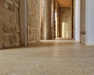 rammed earth floor of a stone house