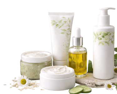 Natural skincare products including organic face cream, herbal serum, and lotion with chamomile flowers.