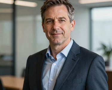Professional portrait of an Australian public sector expert in professional attire, looking authoritative yet approachable, set against a soft-focus modern office background.