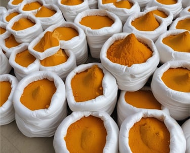 Close-up of vibrant turmeric, red chili, and coriander spices arranged in rustic bowls.