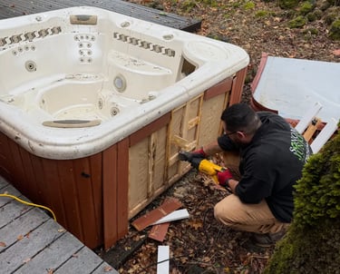 hot tub getting cut up for removal