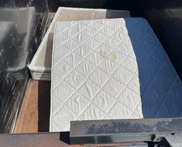 Mattress and box spring in a trailer