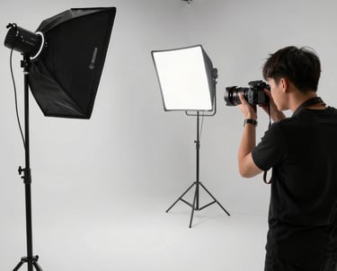 A bright, modern room with luxurious lighting and professional photography equipment.