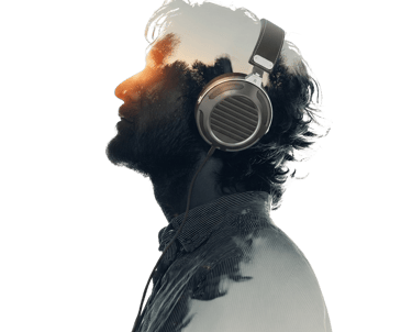 Person wearing AURA PRO comfortable ear pads with protein leather cushions