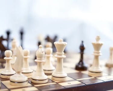 a chess game with chess pieces on a chess board