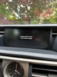 Car infotainment screen displaying a system  ERRORerror message to consult a dealer.