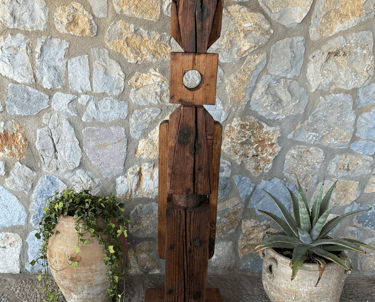 a wooden sculpture of a wooden sculpture of a man