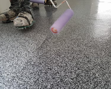 MMA garage flooring installation with decorative flake system and roller application