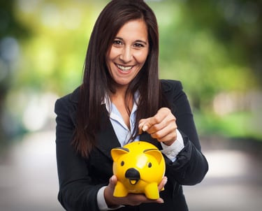 a woman in a business suit holding a piggy piggygy piggy pig