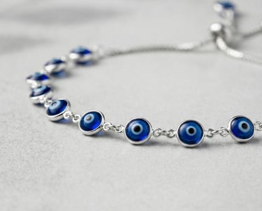 a bracelet bracelet with evil eye charms