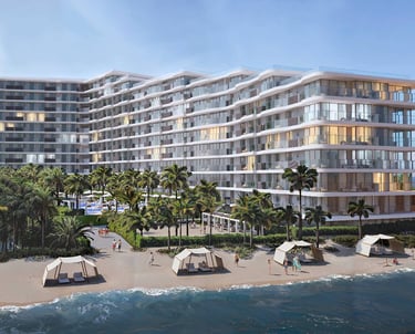 Luxury beachfront hotel resort with modern architecture, palm trees, and beach cabanas on a sunny day.
