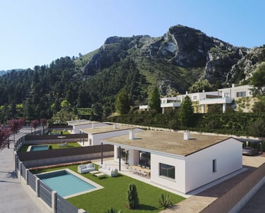 Villas de luxe modernes avec piscines privées et jardins, nichées au pied d’une chaîne de montagnes 