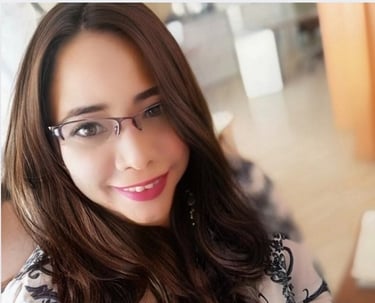 Professional psychologist smiling for a photo in formal wear