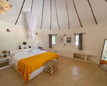 Vue intérieure d'une chambre classique du boutique hotel Maison Fimela situé dans le Sine Saloum