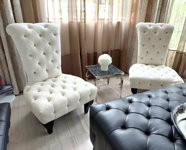 two white upholsteries in living room