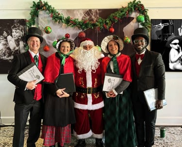 a group of people dressed in santa claus claus claus costume