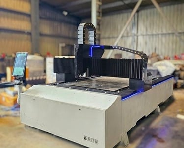 High-precision CNC laser cutting machine at MS Engineering Works for trailer part fabrication
