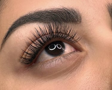 a woman with a black eyeliner and a black eyeliner