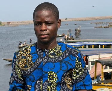 Dahomey African Tours Senior Guide and Tour Planner at Ganvie Stilt Village in Benin