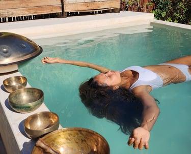 Watsu session in warm water: therapeutic aquatic massage facilitating profound nervous system reset 