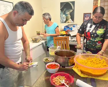 a family making puerto rican pasteles