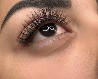 a woman with a black eyeliner and a black eyeliner